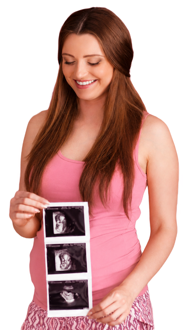 Pregnant woman holding ultrasound scans